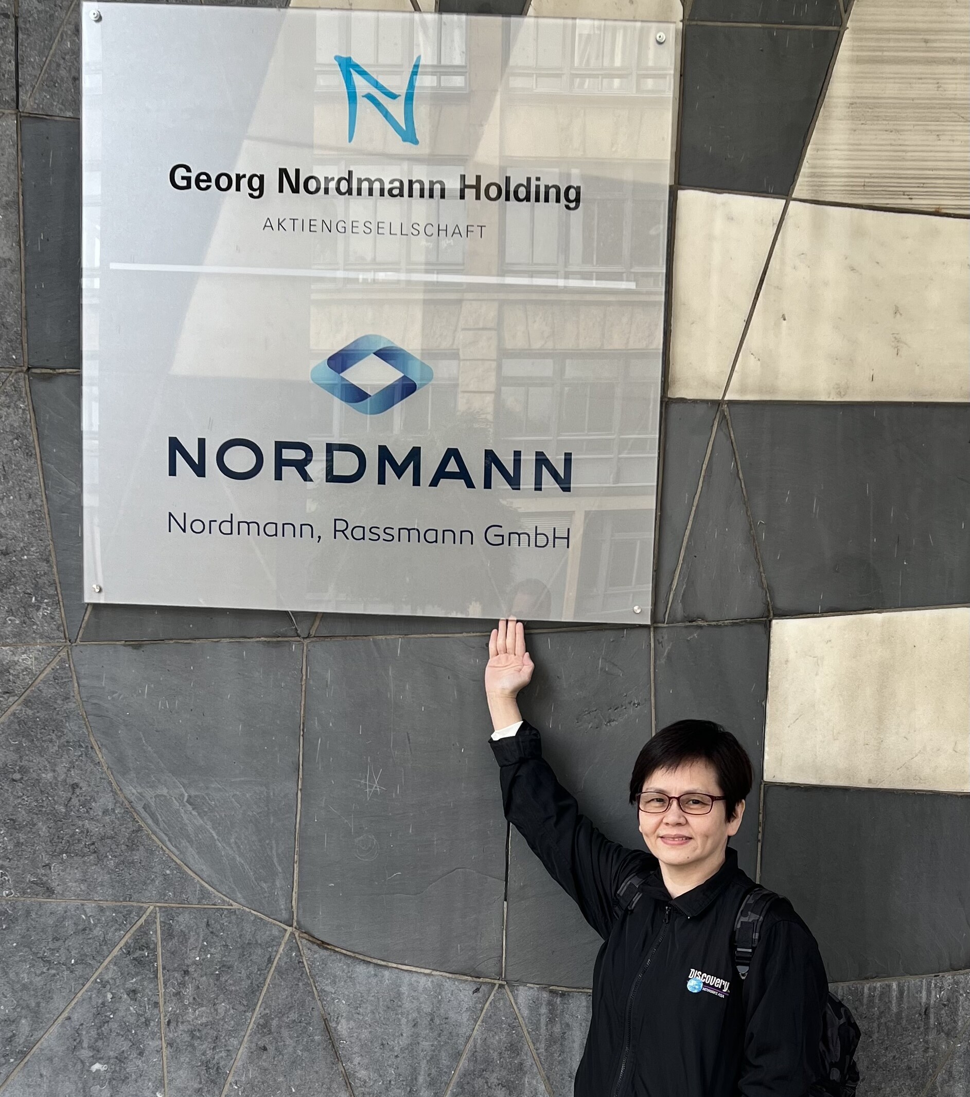 woman standing in front of the Nordmann logo, Jacklyn Yeo